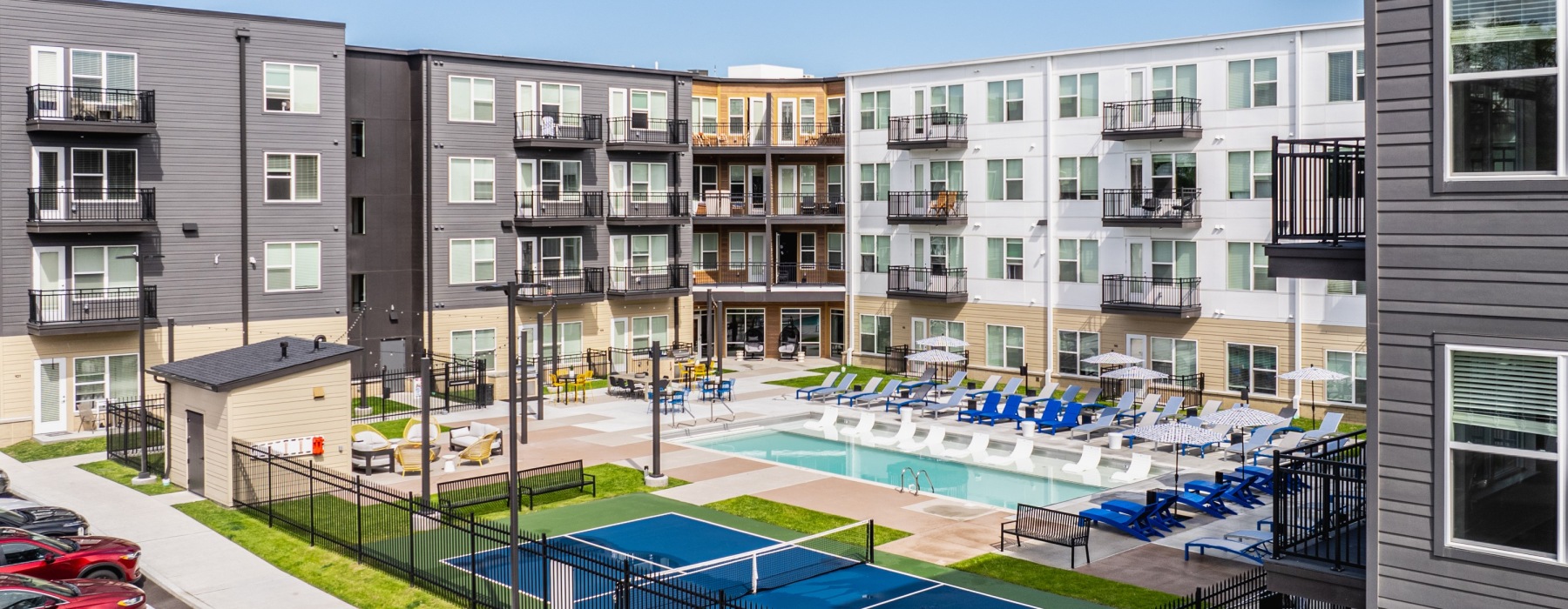 photo of an apartment courtyard with pool