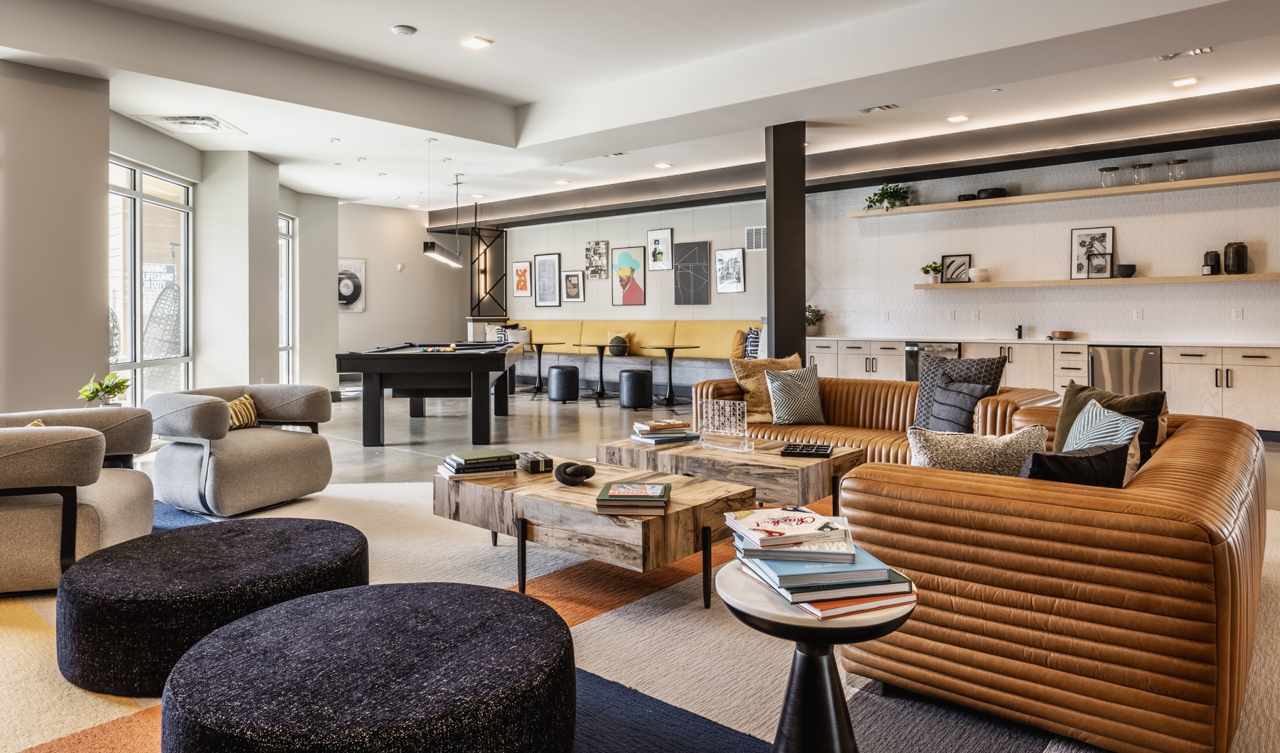 Living Begins Here interior of an apartment complex clubhouse