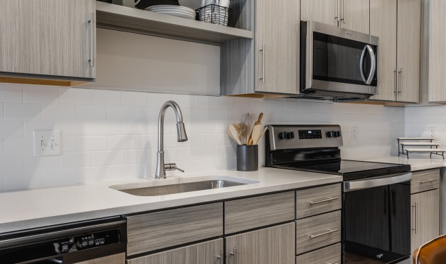 Kitchen apartment kitchen countertops, sink, and appliances